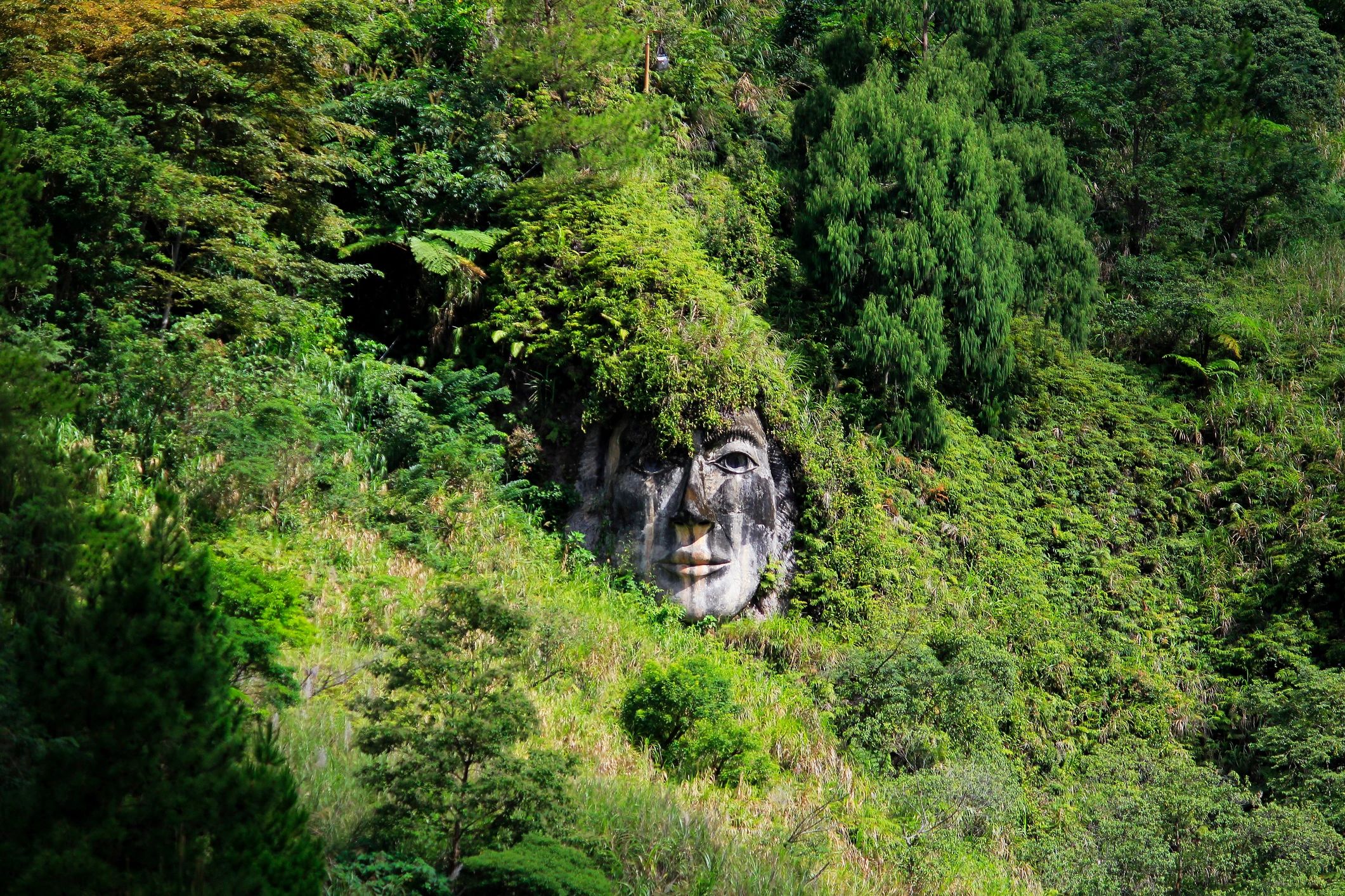 North Sulawesi, Indonesia, June 17, 2015. Carved faces