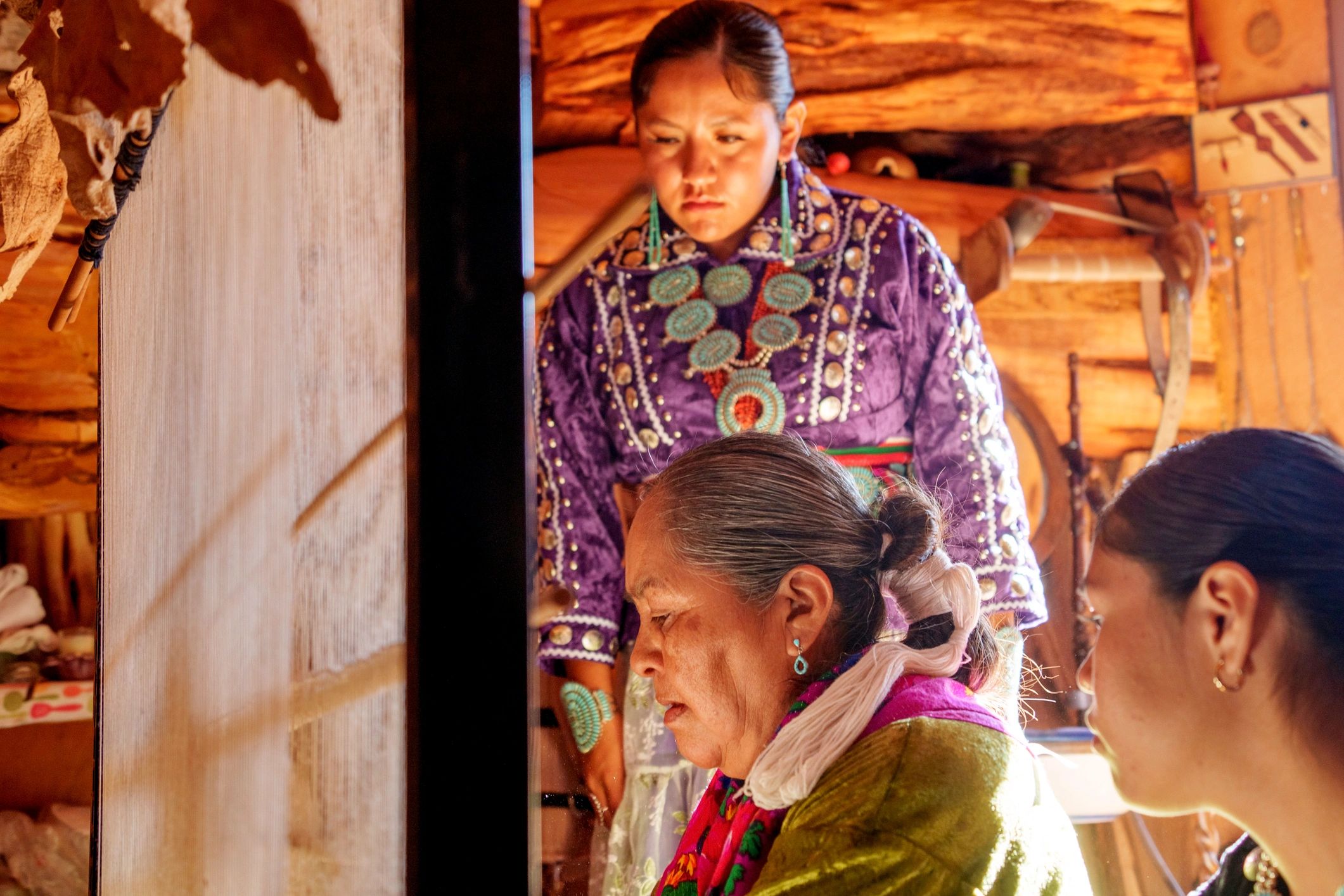 A Navajo Grandmother Teaching Her Teenage Granddaughter How